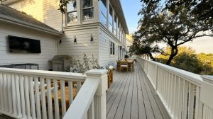 Patio deck with wood railings adding charm and safety