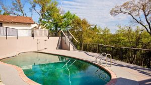 Deck with pool for a seamless outdoor living experience