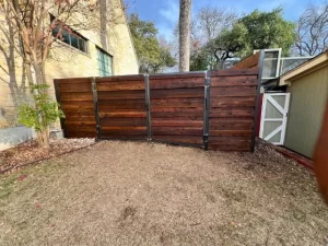 Slatted wood fence offering a modern privacy solution