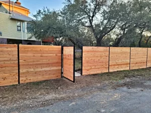 Wood fence with steel frame for extra support and style
