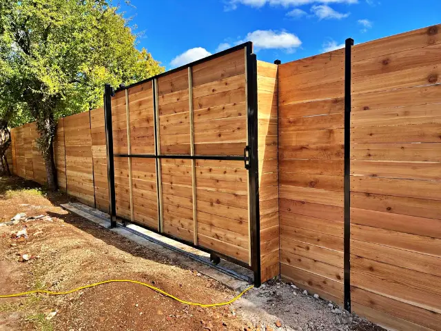 Privacy fence with gate for secure entry and privacy